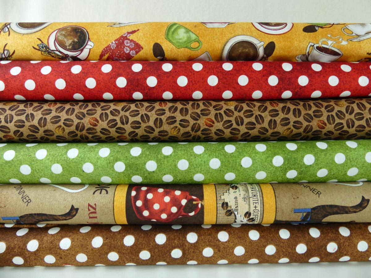 Verschiedene Patchworkstoffe von Quilting Treasures aus der Serie Daily Grind.